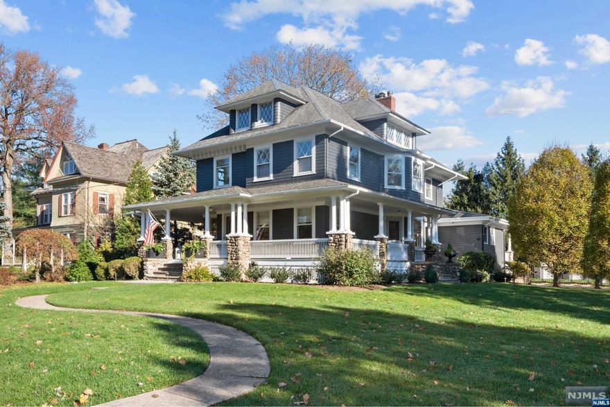 Located on one of Ridgewood's most desirable streets, this home is a special offering for today's modern family, with incredible scale, design, and sanctuary. Fully renovated with 4 floors of living space, the home is the perfect blend of modern and historical. The heart of the home is the kitchen with open floor plan to vaulted family room, overlooking the picturesque backyard with Marbelite pool/spa. Kitchen and bathrooms finished by high-profile New Jersey Interior designer, using the highest end materials and finishes. The primary suite can't be missed with high-style sophistication and eye catching original exposed brick wall. Basement is new with designated home office, living space, and gym. Sitting on 1/2 acre, the wrap around porch is welcoming and overlooks the professionally landscaped grounds. Backyard is perfect for entertaining, private, with built-in gas grill, pool house, kitchen/wet bar and half bath.