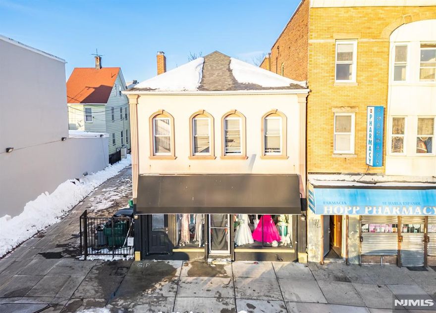 Your next income-producing opportunity is here. This mixed-use property offers nearly 2,000 square feet of ground-level commercial space, plus a well-laid-out two-bedroom apartment aboveâ€”both with separate utilities for maximum efficiency and flexibility. Positioned in an area experiencing active development and strong momentum, this is the kind of asset investors look for: versatile, cash-flow capable, and well-located. Opportunities like this donâ€™t come around often!