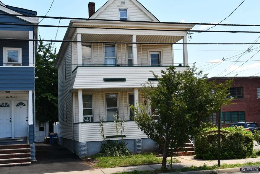 Well maintained 2 Family home located across from school, with easy access to all houses of worship. and local transportation, Great investment, with good rental Income. 2 Car detached garage 4 bedrooms 2 full bath walk up attic finished.