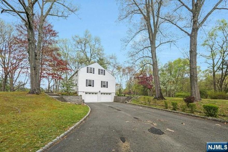 Fabulous location on Norwod's east hill sits one of 2 Wooded level lots, each with .83 of an acre. Older home must be demolished and oil tank removed. Driveway for new construction must be on Lancaster. Norwood boasts blue ribbon school, close proximity to Closter Plaza with shops and restaurants and easy commute to NYC. Must be sold together with MLS # 24012302 Best and final offers due 5/9 at 6pm