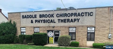 Photo of 380 N Midland Avenue, Saddle Brook, NJ 07663 (MLS # 25023319)