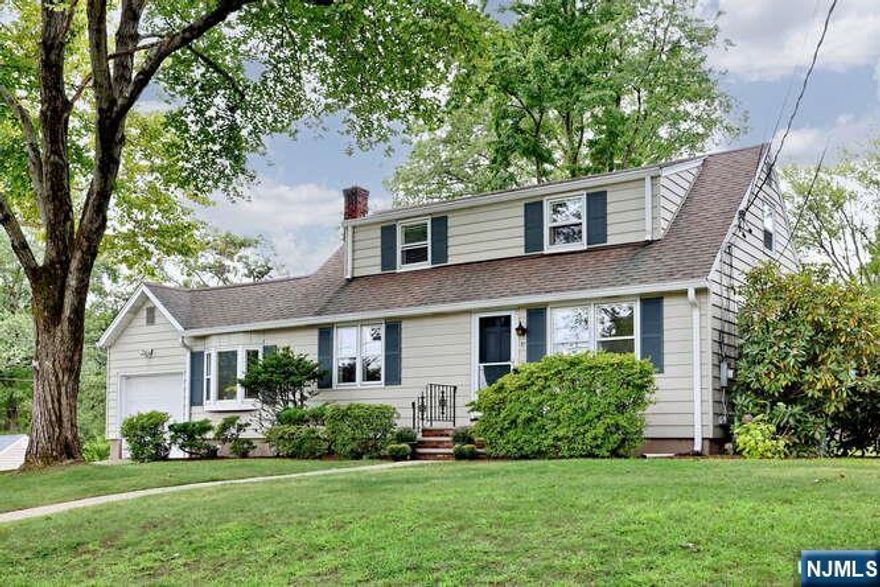 Final/best offers due Wed. Sept 17 at 3pm. Exceptional Value in a Prime Location! Donâ€™t miss your chance to own this incredible propertyâ€”offering one of the best values on the market today! Nestled on a generous 100x100 corner lot, this home boasts a fantastic location in a welcoming neighborhood. Step inside to a warm and inviting living room on the first floor, perfect for relaxing or entertaining. The modern eat-in kitchen features direct access to a patio and a spacious, flat backyardâ€”ideal for outdoor gatherings, gardening, or play. Also on the main level: A comfortable bedroom, full bathroom, a versatile breezeway room with laundryâ€”great as a home office, or bonus space. Upstairs, youâ€™ll find: Two oversized bedrooms with ample closet space (primary BR has 3 closets), and a second full bathroom for added convenience. Handsome wood floors on both levels. The finished lower level offers even more living space, including: a large family room with a built-in bar, a powder room, and a separate utility and storage area. You are just minutes from top-rated schools, major highways, shopping centers, and more. Whether you're starting out, growing your family, or simply looking for a smart investment, this home checks all the boxes. Come see it for yourselfâ€”you will love this home!!!