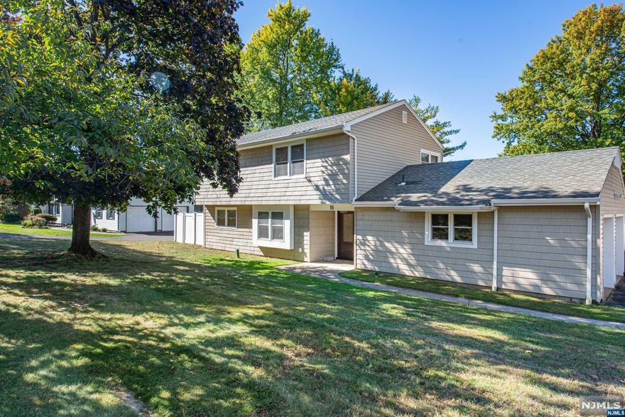 Call Reiley for info&showings 201-951-4877. Welcome to your dream colonial home, where luxury meets timeless elegance! This stunning 4 bedroom, 2.5 bath residence has been completely transformed in 2023, showcasing modern design and superior craftsmanship. As you enter, you're greeted by a bright foyer with high ceilings and abundant natural light. Open-concept living area features beautiful white oak hardwood floors and a vaulted ceiling, creating an inviting atmosphere. Gourmet kitchen boasts quartz countertops, center island with breakfast bar and a charming farmhouse sink. Formal dining room provides an elegant space for entertaining. Cozy family room off the kitchen features sliders leading to a spacious patio overlooking the flat, fully fenced yard ideal for gatherings. Stylish powder room adds convenience on the first floor. Upstairs, the primary suite offers a luxurious retreat with a spa-like en-suite bath. This exquisite home is in a sought-after very quiet neighborhood.