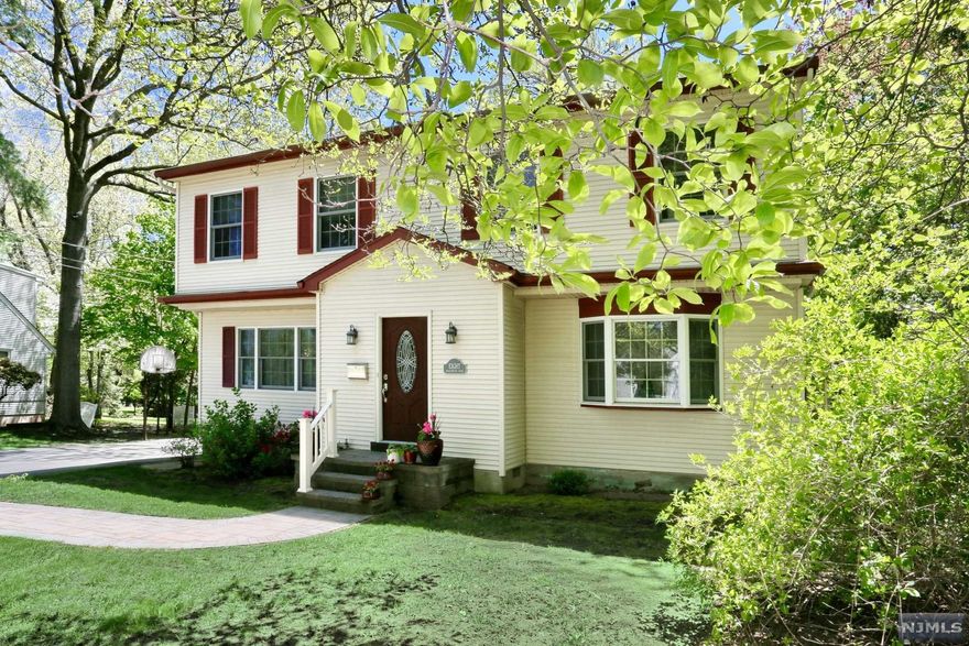 Colonial style 3 bedroom 2-1/2 bath located on quiet street in Cresskill. Features an open Kitchen/Family room area with cathedral ceilings and skylights. Hardwood floors throughout the first floor. Large backyard with beautiful patio and firepit. Home comes with full house Generac generator. Short distance to award winning schools and NYC transportation. HOME WARRANTY INCLUDED.