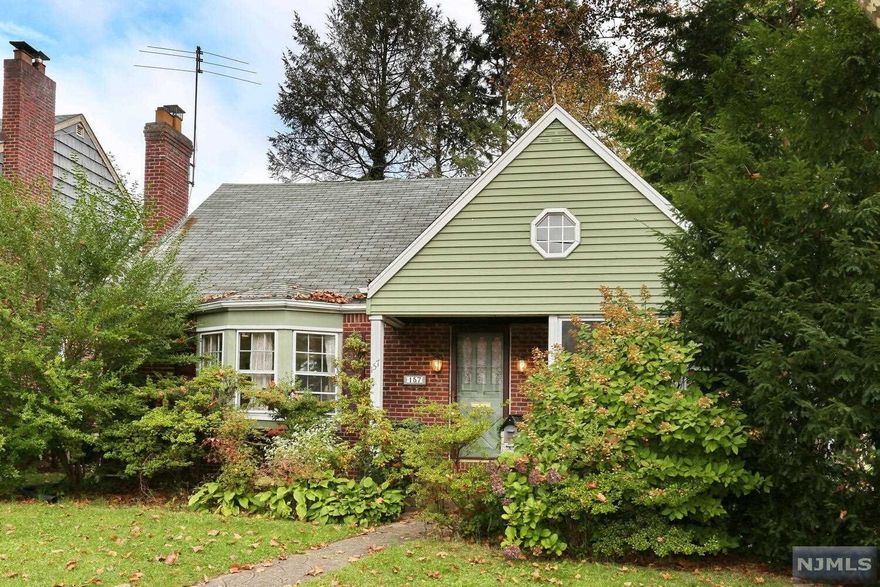 Take a look at this lovely home: Visit this spacious & charming Expanded Cape/Colonial home on quiet street. Move in condition home that offers: Great neighborhood. Brick and alumina siding exterior with fenced in back yard. A picture perfect LR with wood burning fireplace and recessed lighting and with large bow arranged windows. In addition, a spacious Formal dining room with crown molding. Plus 3 seasons large glassed enclosed porch Second floor offers 2 spacious bedrooms: Large Master bedroom and 2nd bedroom, Full bath and plenty closet spaces. . Basement is Full and Finished with 1/2 bathroom - great for entertainment. Separate Laundry room and Utility room and half bath as well in basement. Hardwood flooring throughout. Very close to NY Transport, House of Worship, Park, Near to Hospital, schools and shopping center. A must see - Sold in As Is..