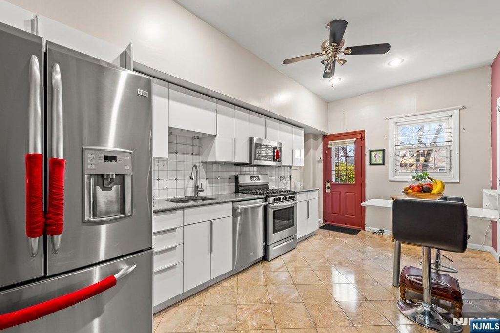 Photo of 102 Treacy Avenue, Newark, NJ 07108 (MLS # 26009381)