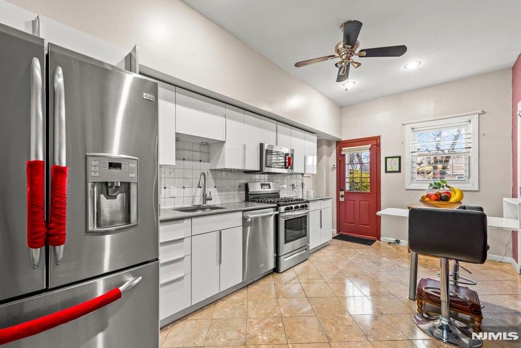 Photo of 102 Treacy Avenue, Newark, NJ 07108 (MLS # 26009381)