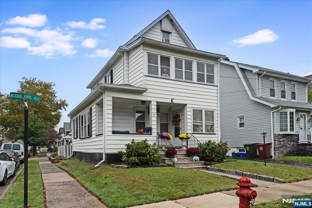 Photo of 25 Woodland Avenue, Nutley, NJ 07110 (MLS # 26017443)