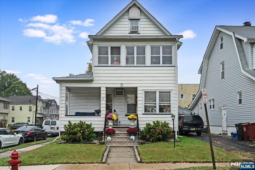 Photo of 25 Woodland Avenue, Nutley, NJ 07110 (MLS # 26017443)