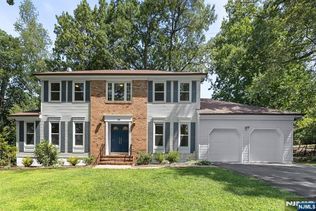 Photo of 36 Scarsdale Drive, Livingston, NJ 07039 (MLS # 25036594)