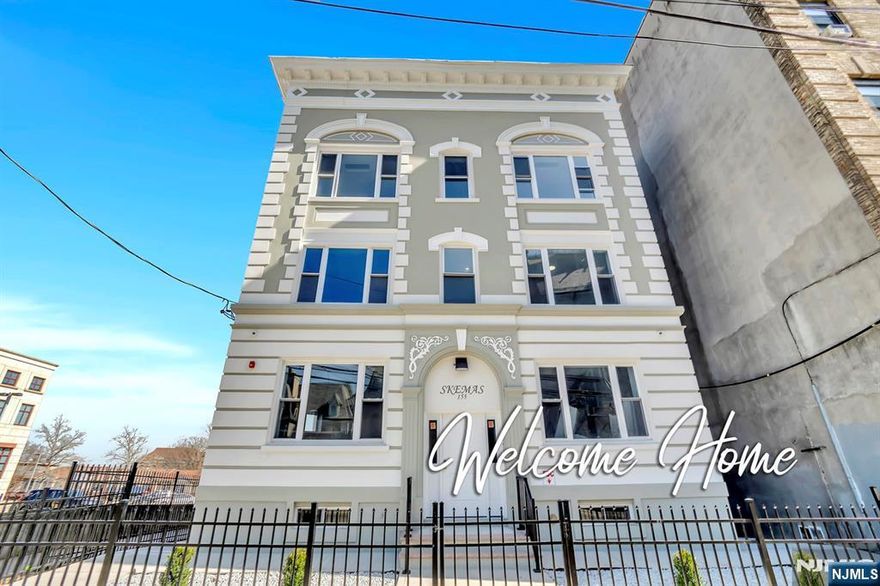 Modern living meets city charm in this stylishly rebuilt 1-bedroom apartment at 155"157 Clifton Avenue, Newark, located directly across from the iconic Cathedral Basilica of the Sacred Heart. This beautiful unit features an open-concept living, kitchen and dining area, complete with stainless steel appliances, including a refrigerator, ceiling-mounted ductless heating and cooling systems, and in-unit laundry hookups all thoughtfully designed for comfortable, low-maintenance living. Set within a recently updated building, residents also enjoy shared access to a yard, a rare perk in city living. Take a relaxing stroll through nearby Branch Brook Park or explore everything Newark has to offer just minutes from downtown dining, shopping, concerts, and the Prudential Center. Convenient public transportation nearby makes commuting effortless. Tenant pays gas and electric only. No pets permitted. Some photos may be virtually staged. Photos may not be of actual unit.