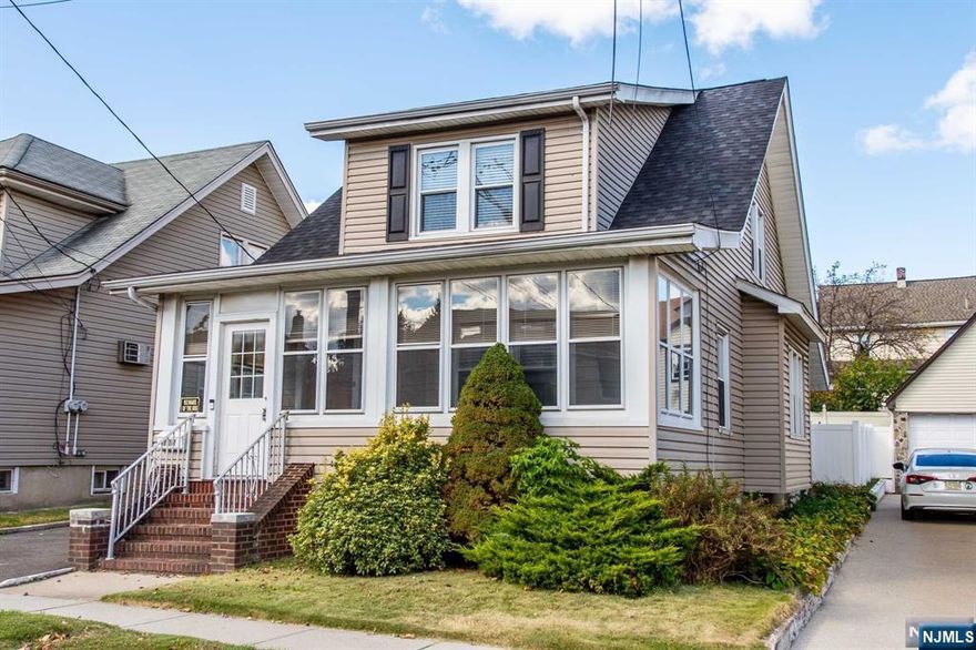 Welcome to this lovely 4-bedroom side hall colonial-style home in the heart of Clifton, NJ. Located on a tree-lined street, this home offers the perfect balance of functionality & charm while offering city convenience. This ideal home offers a generous space for living, entertaining, and the possibility of working from home. With a spacious bright and airy living room complete with windows that let in natural light make it perfect for relaxing or entertaining guests. The formal dining room is ideal for hosting dinners or special occasions, with easy access to the kitchen and living area. Four total bedrooms all generously sized with one bedroom on main floor and three on the second floor. Partially finished basement with additional half bath plumbing fixtures in place. The driveway offers off street parking for 3-4 cars leading to a 2 car detached garage. Driveway paved 2 years age. New roof 1 year ago. MULTIPLE OFFERS RECIEVED!! DEADLINE FOR OFFERS IS 6PM SUNDAY OCT. 20, 2024.