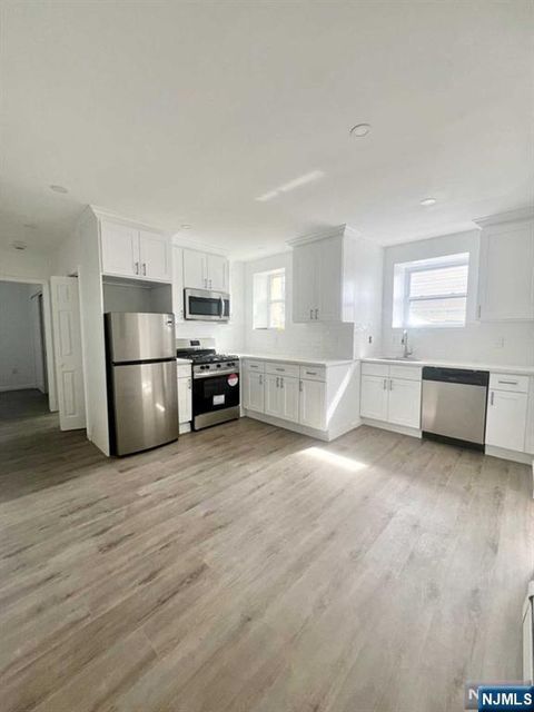 Photo of 280 Macarthur Ave #3, Garfield, NJ 07026 (MLS # 25037616)
