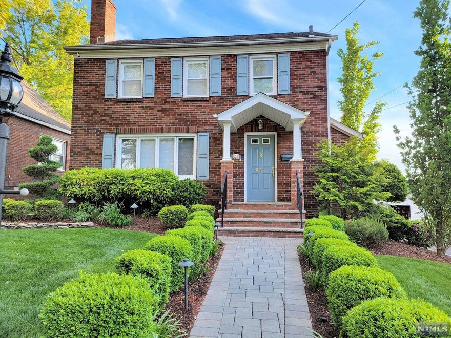 This stunning home has it all! Feel the warmth as you step into the LR with gas fireplace. Granite EIK with huge center island features: Decora maple cabinets, Electrolux 6 burner SS range/oven & hood, Miele dishwasher, sharp microwave drawer & GE Cafe French door fridge. 1st 1/2 bath for your convenience. Open layout to DR with maple full wall built-ins. Natural lighting shines through sliding doors which lead you to a Timbertech composite deck with gorgeous views of the professionally landscaped property. 2nd fl: master bedroom with California Closet wardrobes, 2 additional BR's & full tile bathroom. Stand-up attic with plenty of storage. Finished basement has a family rm, home office with California Closet desks and flooring by FLOR, laundry rm and utility rm with Elfa shelves. 3 zone heating , 2 zone central air , alarm system & home automation are just some of the amenities featured. Architectural lighting & irrigation complete the exterior of this impeccable home.