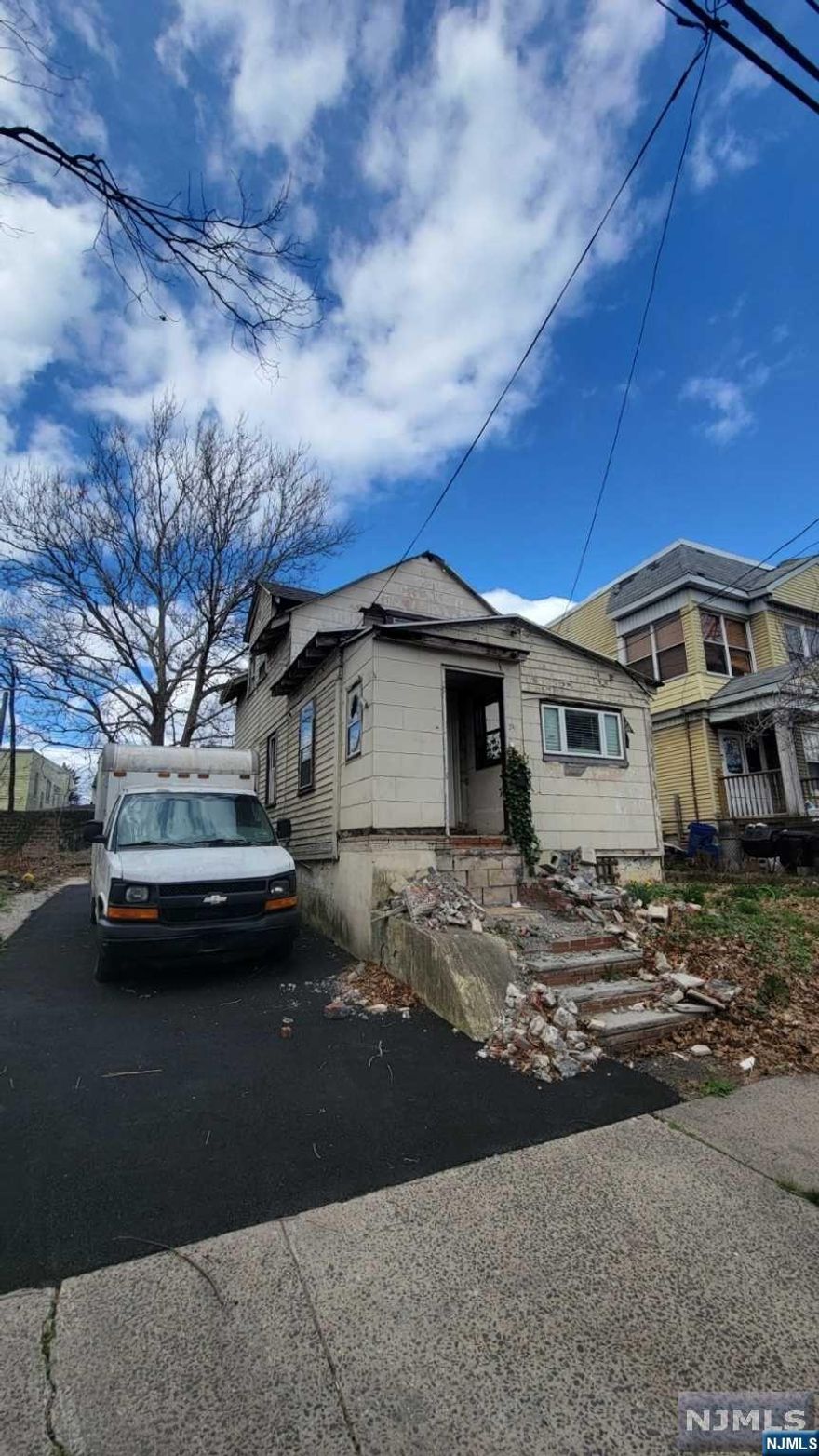 Attention, Investors! Unlock the full potential of this prime property zoned for a two/three-family residence. Fully gutted with two bedrooms, one bath, and an unfinished basement. This property has possibilities for expansion.
