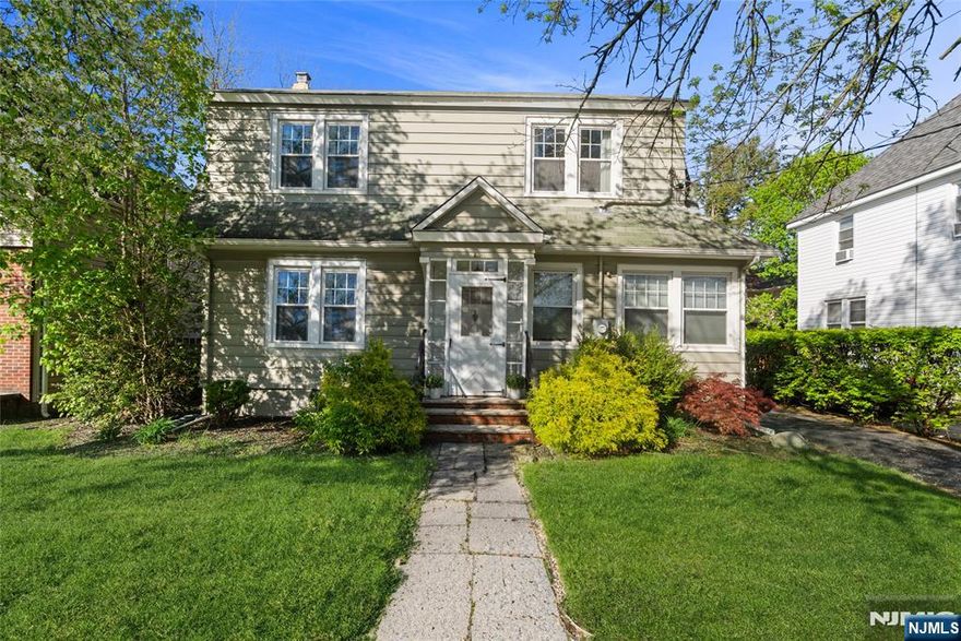 Beautifully maintained Colonial home offering 4 bedrooms and 2 full bathrooms, ideally located in a highly desirable area close to downtown Maywood, top-rated schools, major highways, and convenient NYC transportation. A sun-drenched foyer welcomes you into an expansive living room highlighted by walls of windows, along with a formal dining room with rich hardwood flooring, and a modern eat-in kitchen. The first floor also includes a versatile bedroom or private office, along with a full bath for added convenience and flexibility. Upstairs, youâ€™ll find three generously sized bedrooms (4th bedroom currently being used as a walk-in closet), and a full bath complete with a timeless clawfoot soaking tub. A charming sunroom provides the perfect spot for morning coffee or enjoying quiet moments. The fully finished basement offers additional living space with a dedicated laundry area and abundant amount of storage. Step outside to enjoy a backyard ideal for entertaining and summer gatherings, complemented by an oversized two-car detached garage complete with its own electric subpanel. A rare opportunity to own a home that perfectly blends classic character, modern comfort, and an exceptional location. This is where your next chapter begins â€“ Welcome Home!