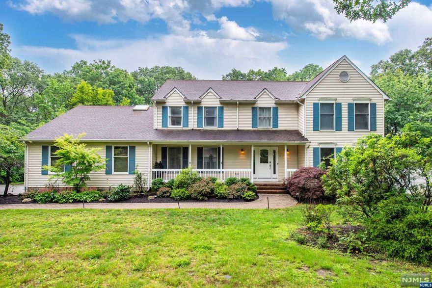 Welcome to this beautiful center hall colonial located in desirable "Saw Mill Estates" offering spacious rooms throughout; close to 4700 sq ft not including basement, in-ground heated gunite pool w/brand new decks w/fiberglass paneling leaving no obstructive view of the nature that it's nestled in. The home sits on over 1 acre of land, mostly leveled w/a large fully fenced-in private yard. New whole house generator in 2022. The first floor boasts a grand foyer leading to a large dining room and formal living room, beautiful kitchen w/high end appliances, center island w/seating, additional dining area open to the spacious family room w/new modern built in fireplace, sun room perfect for relaxation, bedroom, full bathroom, laundry and garage entry. Second level offers a grand master bedroom w/en-suite bathroom, walk in closets; princess suite w/private bathroom, two additional bedrooms and full bathroom. Family room, den, gym, storage and utility rooms completes the basement level.