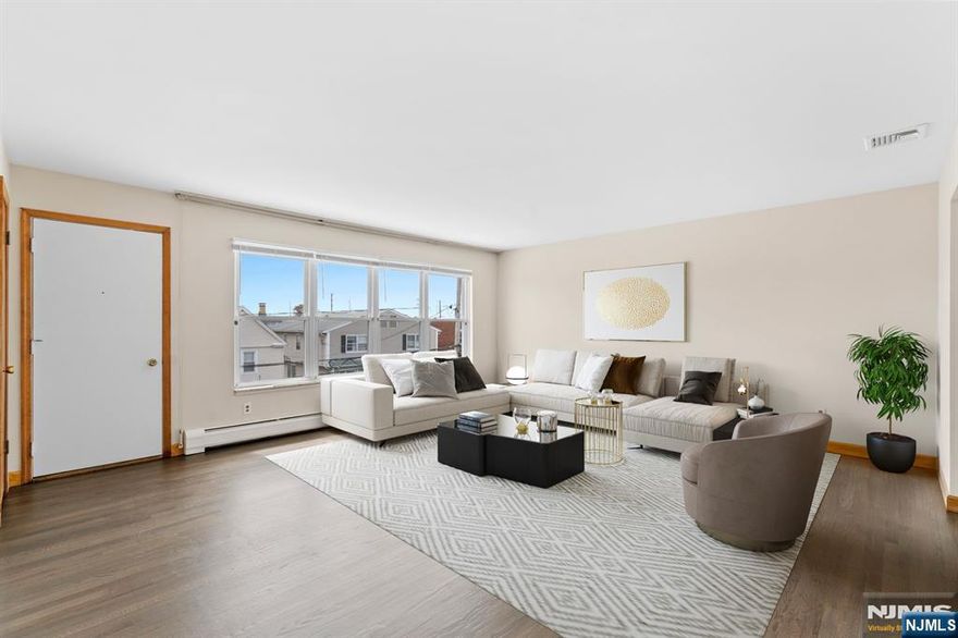 ONE MONTH FREE RENT! Very spacious two bedroom apartment with lots of upgrades. Newly refinished hardwood floors, brand new kitchen cabinets, brand new quartz countertops, brand new stainless steel appliances. Lots of closet space with two large walk in closets and additional smaller closets. Large living room, large dining area that fits a full size dining table. Private balcony, shared yard, and off street parking. Landlord pays for water, Tenant pays for gas and electric. Laundry hook ups in garage, no pets. Good credit and proof of income/funds a must.