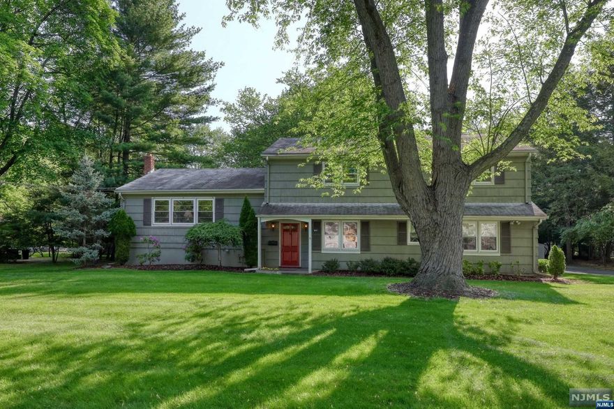 LAND! LAND! LAND! COME SEE THIS VERY LARGE HOME SITUATED ON A 130 FT. WIDE BY 284 FT. DEEP! 0.85 ACRE OF PARK LIKE LEVEL PROPERTY IN A GREAT SECTION OF GLEN ROCK! THE SIZE OF THE HOME IS AMAZING AND MAKES IT GREAT FOR ENTERTAINING. VERY LARGE LR, FDR AND A LARGE MEIK, 4 BEDROOOMS, 2.5 BATHS AND FULL FINISHED BASEMENT ENCOMPASS THE MAIN PART OF THE HOUSE. IN ADDITION THERE IS A PRIVATE GUEST SUITE OR PROFESSIONAL OFFICE WITH SEPARATE ENTRANCEARE WHICH FEATURES 2 MORE BEDROOMS, FULL BATH AND TWO MORE ROOMS AND SEPARATE ELECTRIC METER! OTHER GREAT FEATURES OF THE HOME ARE A NICE SIZE TREX DECK AND BRICK PATIO AND PLENTY OF ROOM FOR A POOL!