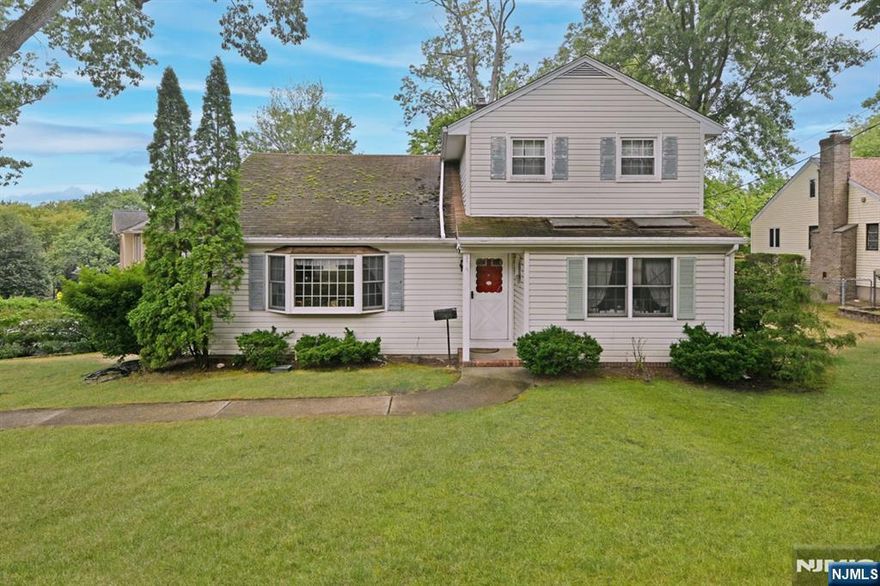 Expanded Ranch w/2,254sf & all large rooms 4BRs total w/1 bedroom conveniently located on the 1st floor. 2 updated baths w/one full bath on 1st & 2nd floor Close to elementary school, multiple houses of worship, Petruska Park, shopping, NYC trans & more Lovingly maintained by current owner for 50+ years. Perfect for extended family or work from home with 1st floor BR and bath, plus large Fam Rm Formal LR is 21'5"x17', FDR is 10'x10', Fam Rm is 17'x13'7", MEIK is 13'6'x12'4" w/center isle, large pantry & outside entry to deck Primary BR is 21'5"x15'5" Central a/c, deck, u/g sprinklers, vinyl siding. Double width concrete driveway. Gas forced hot air heat. Some upstairs bedrooms have a separate zone of electric heat Full partially finished Basement. Pull down stairs to attic Please note the home is in good condition, with no known issues, but will be sold in as-is condition, including the roof, furn, c/a/c, deck etc. All room sizes are approximate