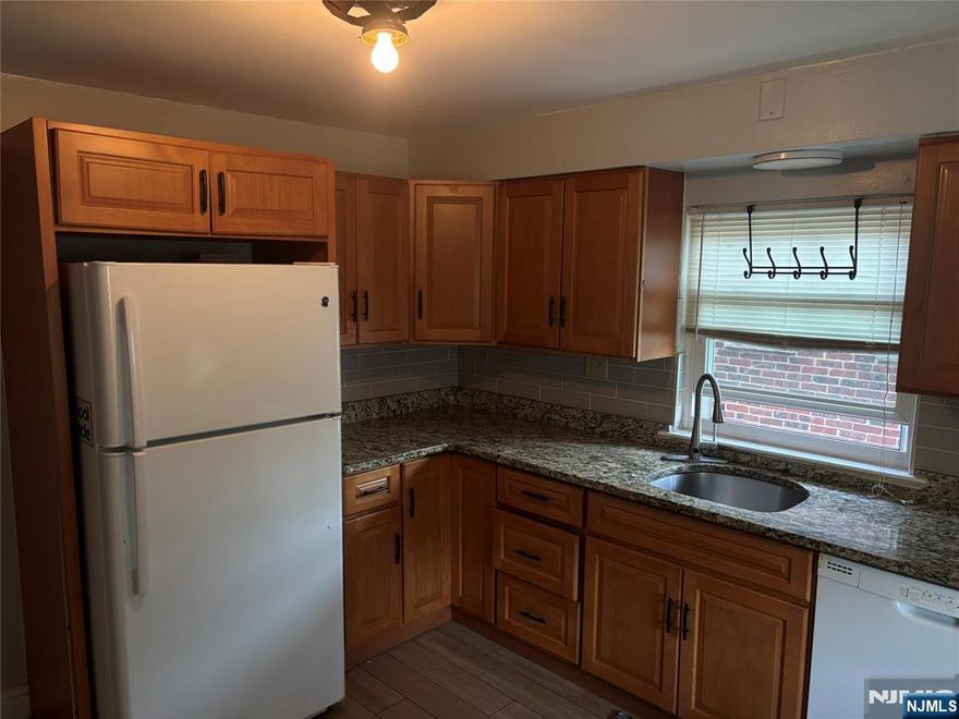 Second Floor: 2 BEDROOMS, 1 BATH, EIK, LIVING ROOM, MODERN UPDATED KITCHEN, LARGE ROOMS, CLOSETS,