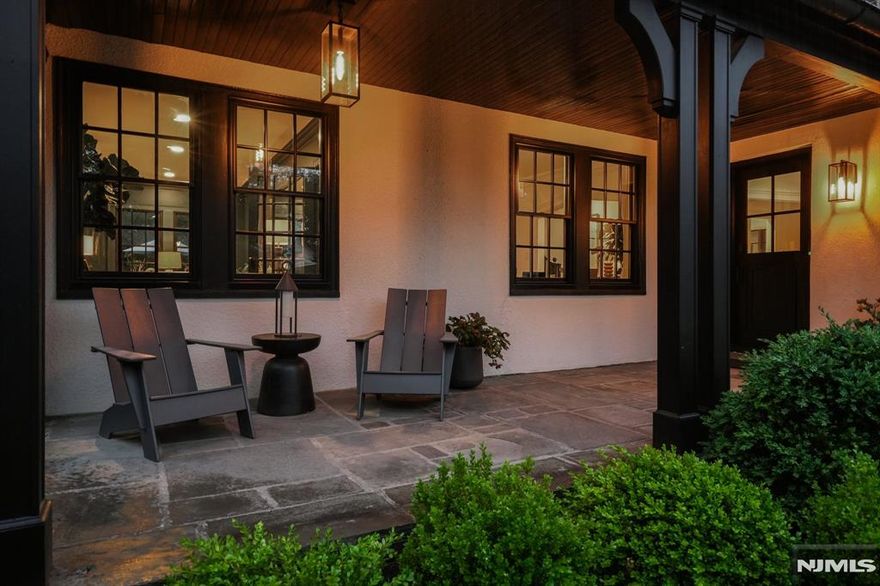 16 The Fairway is a masterclass in design-forward living, where Montclair sophistication meets Brooklyn brownstone soul, wrapped in a Tudor facade of layered brickwork. Reimagined with intention and architectural flair, this home is a study in balance: bold yet timeless, curated yet livable. Inside, the kitchen is a thoughtful blend of form and function, anchored by fresh finishes and elevated utility. An editorial-worthy dining room and a transcendent, zen-like living room set the stage for entertaining, while a wonderfully cozy library-lounge offers a quiet, soulful retreat. Five bedrooms and four impeccably-renovated baths; the primary ensuite to soothe the soul with a walk-in closet/dressing room, a soaking tub that overlooks the garden, and a double shower. A layout that flows like a narrative, each space more inviting than the last. The fully finished lower level feels like its own destination: a boutique-style screening/ family room, powder room, and a laundry space that's more luxury suite than utility zone. Step outside to a dream-worthy European courtyard, the kind of atmosphere that invites al fresco dinners under string lights. Out front, a covered porch offers a quieter moment to take it all in. From morning coffee on the front porch to golden hour in the courtyard, every inch of this home was crafted to inspire. At 16 The Fairway, beauty isn't just seen it's lived.