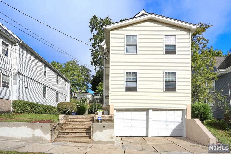 Well maintained and cared for this beautiful 2 family home, located on a desirable street in Prospect Park is ready for a new owner or investor. First floor offers an updated porch, beautiful living room, formal dining room, 2 bedrooms, an eating kitchen and a full bath. The 2nd floor is mirror image to the first floor, plus a gorgeous den and on the third floor you have 2 more bedrooms and a loft. The basement is fully finished, with a small bar, REC room, laundry area, an office and access to the 2 car attached garages. All 3 floors have separate entrances. Updated furnaces, hot water heaters, one year old roof and solar panels installed in 2019 with 25 year warranty and fully owned. This is a beautiful home with a deep lot of 50x134. Close to parks, schools, houses of worship and major highways.