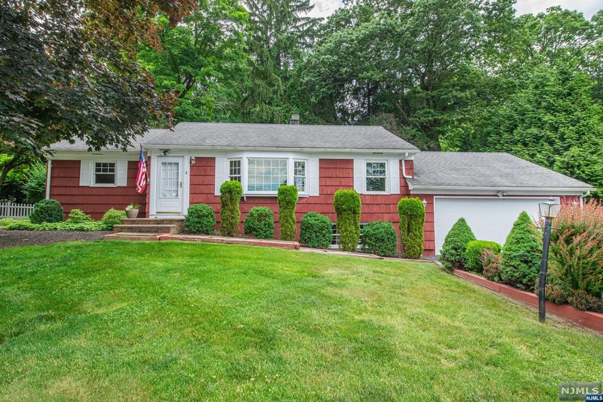 Charming & nicely updated! One floor living sweetly nestled on the corner of a quiet neighborhood. Meticulously maintained!! Boasts tons of great features throughout with beautiful hardwood floors. Three generous sized bedrooms and an updated full bath. Open and bright living room and dining room. Functional kitchen with tons of cabinet space. Sweet sunroom is great for entertaining or enjoying your morning coffee! Nicely set off the backyard deck. The two car garage and basement space provides for plenty of storage space and potential for additional living. Closets throughout, and the lower level includes a full laundry room & bathroom for added convenience. This home is ideally located on a quiet street, yet close to the Rockaway Mall, Routes 80 and 46, and just minutes from the town beach, recycling center, library, and scenic hiking trails. Meticulously maintained and beautifully presented, this gem is sure to sell quickly. Don't miss the opportunity to make it yours!