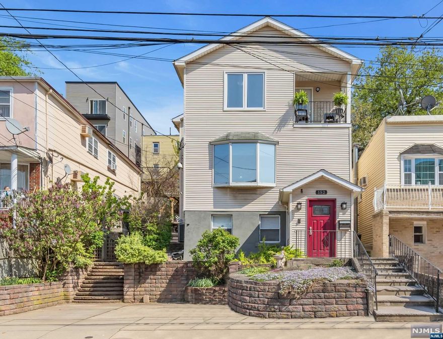 Welcome to your Dream Home in Jersey City Heights-This Single-Family Home boasts over 3000 square feet of Tri Level Living-perfect for those seeking comfort, ease of maintenance, & top-of-the-line amenities for a sophisticated lifestyle. Built from the ground up in 1998 w/ enough space to house everyone under one roof, you can work from home, & easily entertain overnight guests. The masterful design lends to multiple uses of the space. Enjoy the sunshine that floods this home. Its high ceilings enhance the already spacious feel while the open flow allows everyone to stay connected when desired. You'll fall in love w/ the Dream Kitchen. Stainless steel appliances & walk-in pantry are just a few of the many gems this home offers-heated bathroom floors are another. Everyone can carve out their own special spot both inside & out. Enjoy time relaxing on the 2nd floor balcony or in the multi-tiered rear & side yards. Privacy abounds.