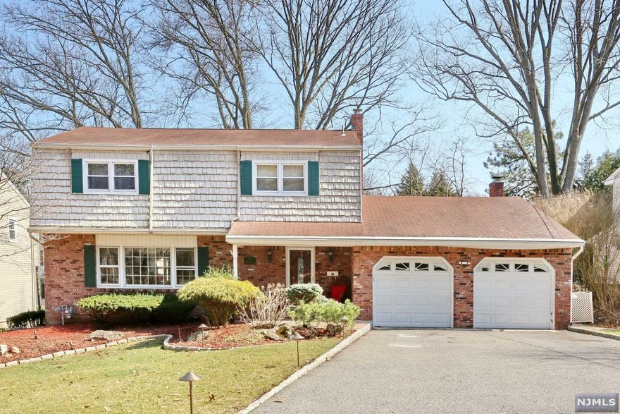 Charming center hall colonial set towards the end of a cul de sac on a premier block in Paramus. As you enter the large foyer, you will see the formal living room that is also open to the formal dining room. The updated eating kitchen offers another dining area, open to the great room w/gas fireplace and dramatic ceilings. Half a bath, laundry room and sliders from the kitchen lead you out to the large deck and enclosed gazebo, hot tub for those fun nights of hosting and bbqing. The second floor offers 3 large bedrooms, full bath and a primary bedroom with double closets and full bath. The basement is fully finished with a nice size rec room, office, gym, bath and utilities. Begin your next chapter in this low tax area, near shopping centers, parks and close proximity to NYCity.