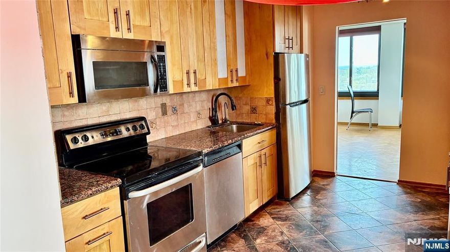 Spacious and beautifully updated condo (1,500 sq. ft.) on the 10th floor of the highly sought-after Winston Towers, featuring stunning Hudson River views. The expansive layout includes a large living and dining area with direct access to an enclosed terrace, perfect for enjoying the scenery year-round. The renovated eat-in kitchen boasts granite countertops and modern appliances. Primary suite includes two walk-in closets and a luxurious full bath. A generous second bedroom offers river views and ample closet space, complemented by a modern guest bath and abundant storage throughout. Including a same-floor storage unit. This luxury residence includes 24-hour doorman service, outdoor pool, tennis and basketball courts, a children's playground, and a new fitness center. NYC bus at doorstep, GWB minutes away, close to shopping, schools, and places of worship.