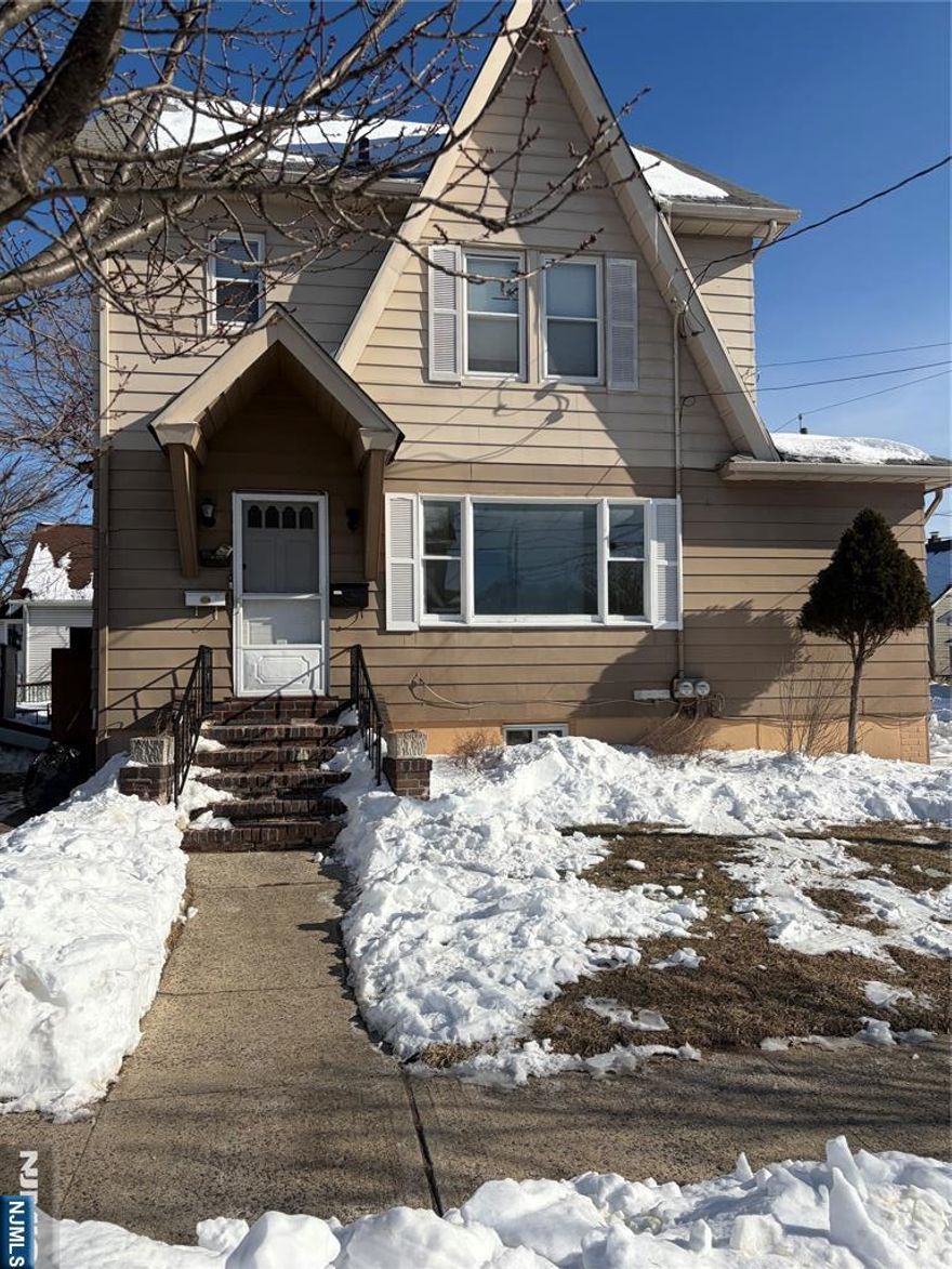 Large 3 BR 1st floor unit. EIK, LR, basement access ( storage only), use of yard. Close to major highways, NYC bus, shopping, restaurants and more. Tenant to supply refrigerator, laundry hook ups available. Landlord will provide lawn service, tenant responsible for snow removal. New bathroom being installed now.