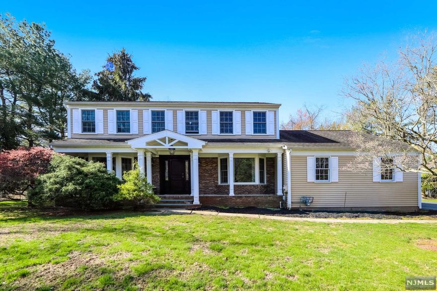 Center Hall Colonial located in one of Old Tappan's sought after neighborhood - sits high on the knoll with overview of the street and expands on a 1 acre plus. Hardwood flooring gleaming thru out. large front to back living room - large kitchen with vaulted addition eating area. full finished lower level with wall to wall carpeting room for game room- rec room - office - and plenty of storage. Well maintained and cared for. Just move in .