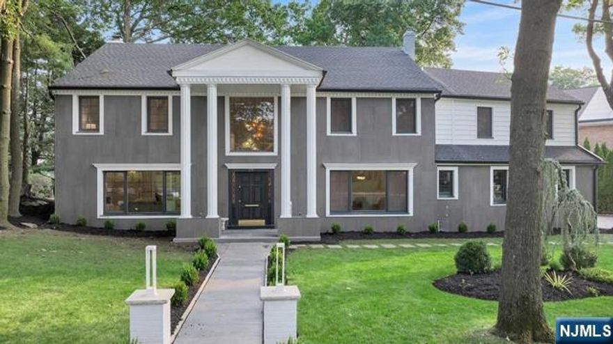 Nestled in the coveted North Cliffs of Englewood Cliffs, this stunning 5 bedroom, 4 bathroom home has been completely renovated to blend modern aesthetics with functional elegance. Spanning 3545 SF, the home offers an exceptional layout and flow with high quality finishes throughout. The heart of this home is the gorgeous gourmet kitchen, featuring top tier Miele appliances, quartz countertops and stunning center island. A beautifully designed mudroom, laundry area, and 1st fl bedrm/office add to the home's thoughtful design. Upstairs, you'll find two luxurious primary suites, each offering a serene retreat, along with two more spacious bedrooms and another full bath. Step outside to enjoy a sun-drenched patio and a beautifully landscaped backyard, perfect for indoor-outdoor entertaining. Located within a short distance of top rated schools, playgrounds and restaurants. Only minutes from NYC, this home presents the best of both worlds while offering the low taxes of EC!