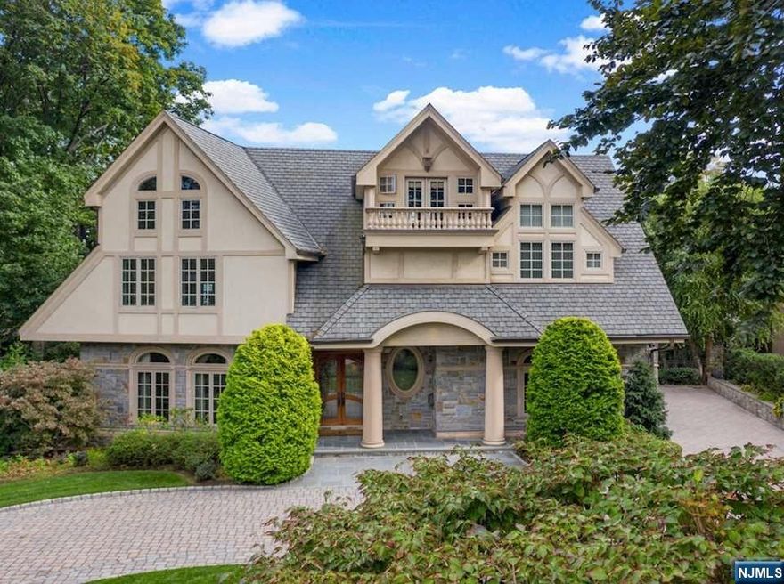 Welcome to a one-of-a-kind, custom-built home filled with luxury, quality, and true craftsmanship in the highly desired town of Rutherford. Only 14 minutes to the Lincoln Tunnel with a bus stop located two minutes from the home. With a grand two-story entrance and a custom domed ceiling, Brazilian Mahogany wood flooring throughout, eight uniquely designed and appointed bathrooms and bedrooms, a great room with a twenty-two-foot vaulted ceiling and a handsome stone fireplace that reaches the full height of the room. Featuring a formal family room, a banquet-sized dining room, an enormous master suite with a spa-like bathroom that has a two-person jetted tub and steam shower. Amenities include a Subzero and Viking kitchen, a wine cellar, an enclosed stone patio, a large in-ground pool, a basketball court, and an outdoor bathroom. Sellers are related to the listing agent.