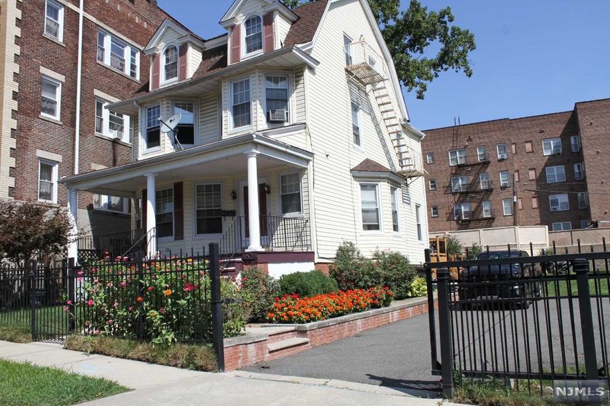 5 Bedroom, 2.5 Bath Colonial in excellent condition. Full Finished attic, Master and Basement. Multi-leveled entertainers' deck. New furnace and water heater. Home has been meticulously maintained and is being sold as is condition. Just move in and unpack. Property has no driveway nor a garage. Back on Market. Buyer could not perform.