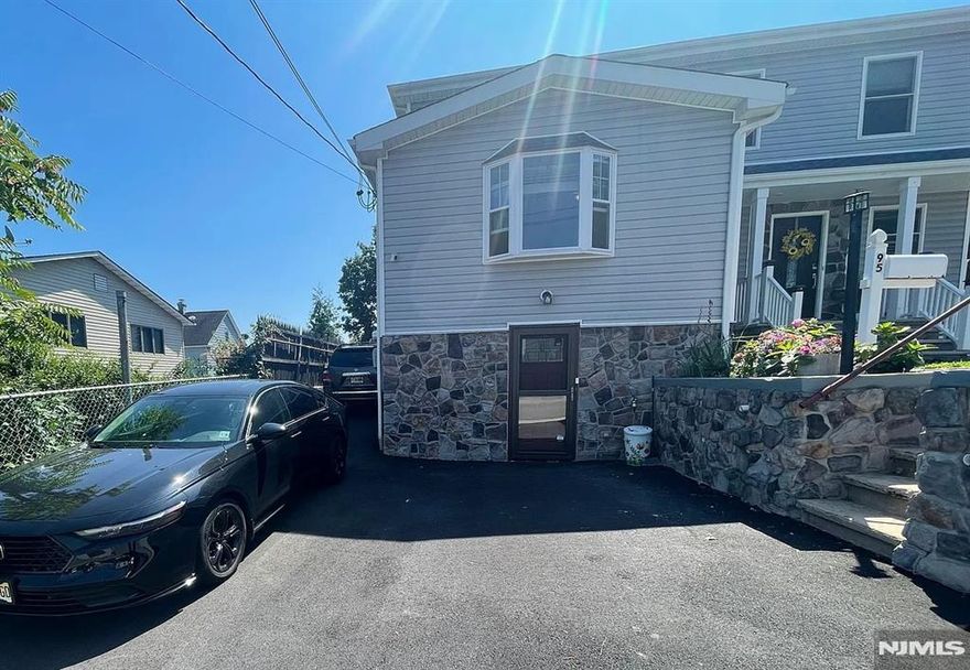 Freshly painted, spacious, and well-taken care bi-level apartment. The first level boasts 3 great-sized bedrooms with generous closets, a full bathroom, laundry in the unit, a hallway closet, and an office area. Hardwood floors throughout. Central Heat/AC. Going up the stairs, you'll find a living room drenged with natural light from a new bay window, dining area, half a bath, and a fully equipped kitchen. It has granite countertops, a dishwasher, a gas range, a microwave, and a refrigerator. A convenient, large parking space for 1 vehicle is also included in the rent. The property is conveniently located close to Main St., Lodi, as well as close access to Route 46 and 80. Reserve your private showing asap!