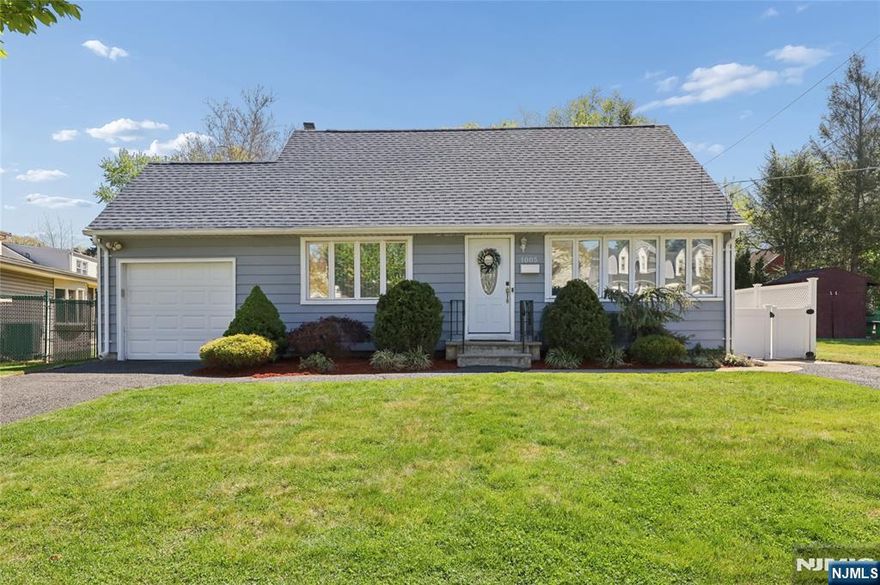 Welcome to this stunning, fully updated home! Thoughtfully modernized from top to bottom, the first floor boasts a bright living room, formal dining room, a convenient first-floor bedroom, full bath, and a gorgeous modern kitchen with granite countertops and backsplash. Upstairs, you will find two additional bedrooms featuring beautifully raised ceilings, alongside a second full bath and ample closet space. The fully finished basement expands your living area with a recreation room, guest room, third full bath, laundry, and utility space. When it is time to entertain, step through the kitchen's sliding doors to an incredible backyard oasis. Enjoy the spacious covered deck, a fully fenced-in yard, and a paved patio complete with a cozy fire pit. Conveniently situated in a prime neighborhood, this move-in-ready home is just a short distance from shops, schools, and the NYC bus!