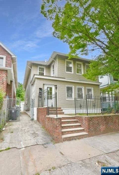 Photo of 137 Osborne Terrace, Newark, NJ 07108 (MLS # 25027422)