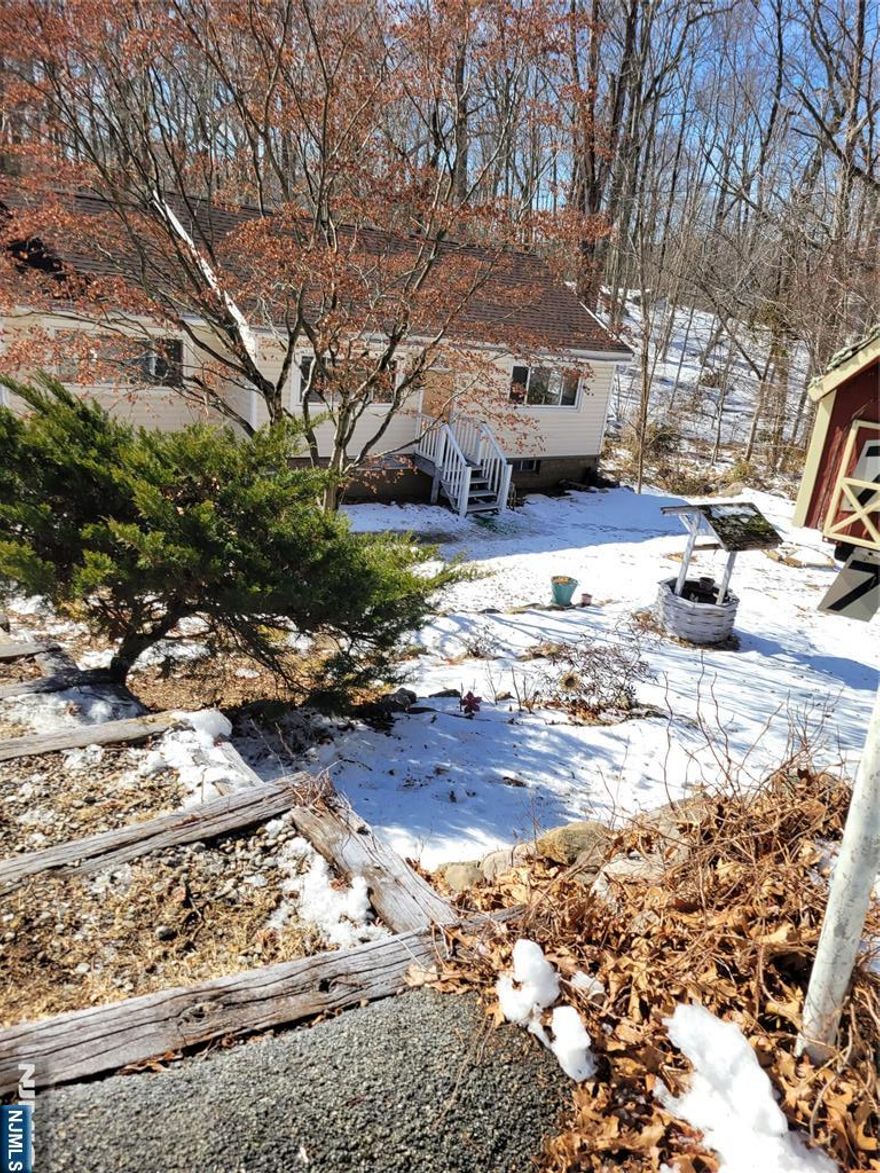 This charming ranch home in Ringwood offers a fantastic rental opportunity with tons of light and tons of potential. Featuring a spacious living area with a wood-burning fireplace, 2 bedrooms, and 1 bathroom, the home provides a solid foundation for someone with a vision to make it their own. The large yard is perfect for outdoor activities or gardening, while the basement offers additional storage space. While the interior needs some TLC, this home offers plenty of opportunity for customization. Conveniently located in a peaceful Erskine Lake neighborhood, this property is ideal for renters looking to add their personal touch.