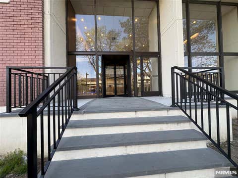 Photo of 1203 River Rd #14M, Edgewater, NJ 07020 (MLS # 26014403)