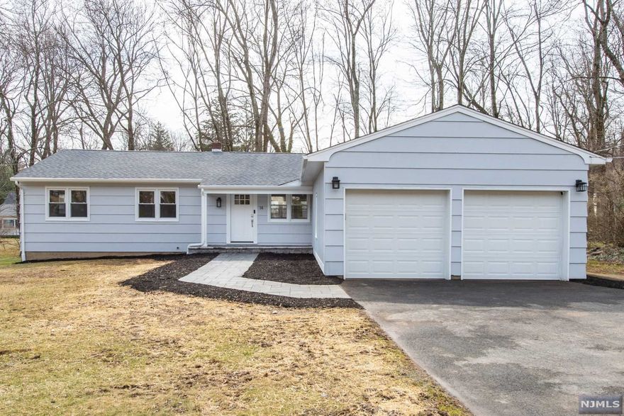 Gorgeous, fully renovated, house " move right in! Make it your own! Fabulous open living space filled with natural light. If you want a brand new, spectacular, kitchen, this is your dream home. The large, quartz island sits up to 8 people, WOW! Built in wine fridge and microwave complement the storage space on both sides of the island. Stainless steel appliances and farm sink, everything is new. In addition to the 4 bedrooms and 2 and a half baths, the fully finished basement provides endless possibilities for extra living space (office, playroom, whatever you would like). Everything has been updated and the house includes a SONOS audio system, Nest thermostats and front door keyless entry " control them from your phone. Gleaming hardwood floors, shiny new windows and slider out to the back yard, too many things to mention. Don't miss your opportunity to make this your home!