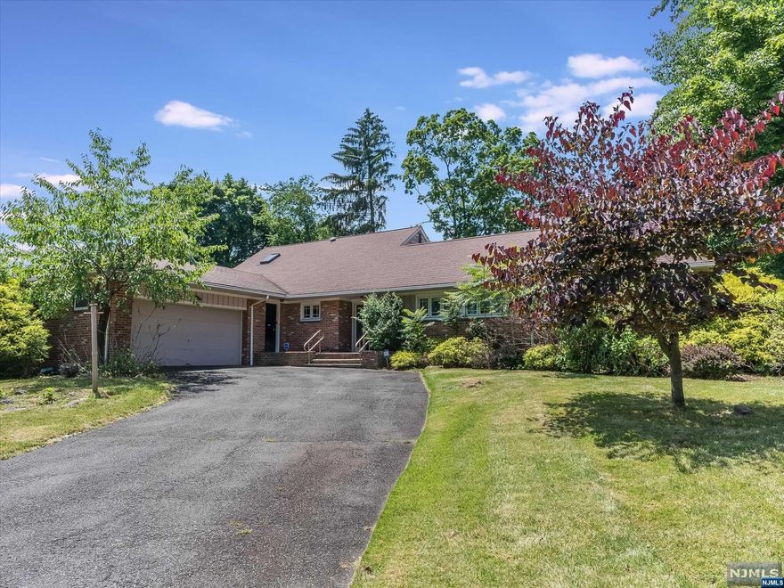 Wonderful opportunity to restore this West Orange Beauty! The past splendor of this property is evident from the moment the door opens! Large and private 1st floor Primary bedroom with en suite with adjoining dressing closet. An Eat-in kitchen with built-in cabinetry leads into a expansive Living room with floor-to-ceiling interior windows that look out onto (2) private outdoor spaces. 2nd 1st floor bedroom that can also be used as an office and/or playroom, or whatever you like! Located upstairs are 2 additional Bedrooms with full bath. Full unfinished basement, which also includes a laundry room, and full Cedar closet, spans the footprint of the entire home and has amazing potential for the creation of additional living space! Great location in West Orange, close to NJ transit and 280. Less than 2 blocks from the prestigious Seton Hall Preparatory School.