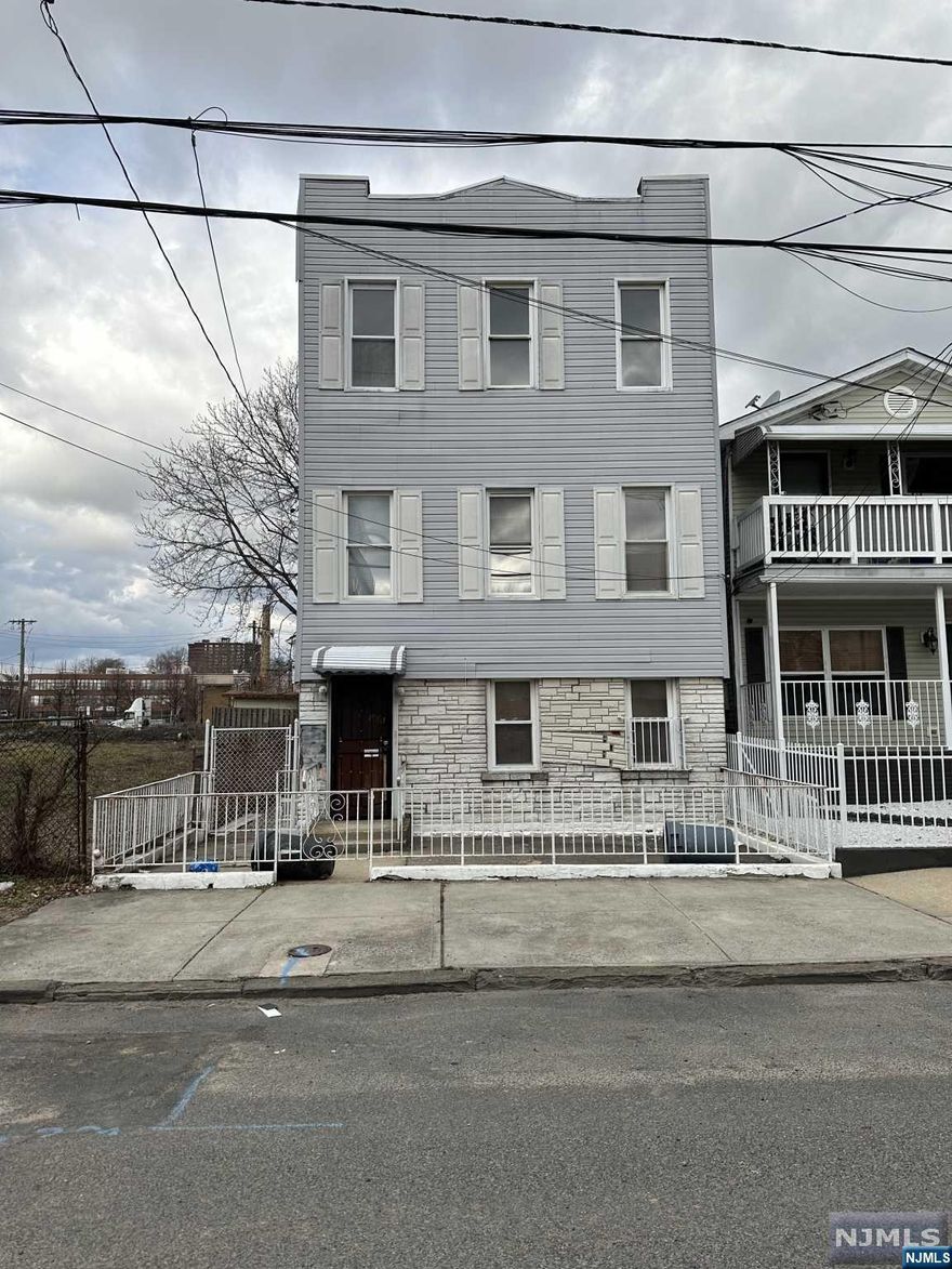 Four bed two bath property perfectly situated in the Communipaw section of Jersey City. Located one block from Berry Lane Park, an abundance of cafe's and shops, Liberty State Park, Liberty Science Center and the Light rail Station. Property needs gut rehab. Only Cash or 203k loans will qualify.
