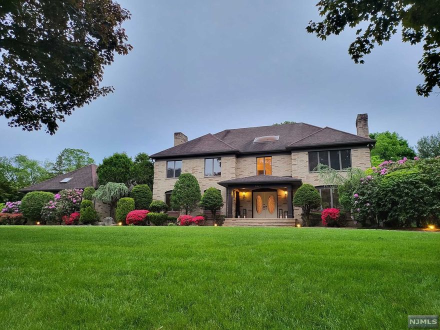 Nestled in the heart of the coveted Lily Pond Estates, this home boasts six bedrooms and six bathrooms, with a Primary Suite on two levels. Beautifully renovated center hall colonial with picturesque landscaping on a well-maintained acre. Two-story entry foyer's grand chandelier commands attention. Enter through French doors to a large living room with a marble fireplace, formal dining room and spacious family room with a floor-to-ceiling stone fireplace and sliding doors leading out to the L-shaped wooden deck. Stunning gourmet chef's kitchen includes two sinks, large center island and Viking appliances with views of the tranquil backyard. Fully finished basement with bath and dry sauna. <br> <br> Move-in ready: 6,000 sf driveway repaved May 2022. Professionally painted, including deck May 2022. Septic tanks serviced and pumped May 2022. Brand new Samsung washer, dryer and Viking microwave installed May 2022. New water heater installed May 2022.