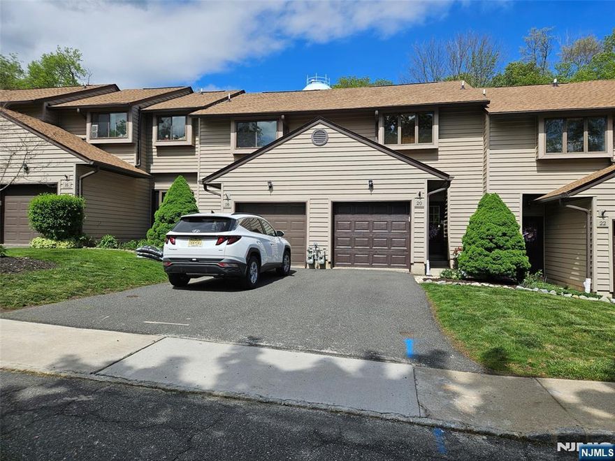 One step leads you into a welcoming foyer opening into a spacious living dining area. Soaring ceilings, views to open loft and double sliders to oversized deck offer an airy living space. The well appointed kit offers ample counter space plus a pass thru to dining and social space. From the LR step out to an oversized deck perfect for entertaining, or take a short walk to the clubhouse, pool, tennis, pickle ball, fitness room for additional fun! The second level open loft is perfect as a den, study or overflow guest area. 3 large closets with built ins are great for additional storage. The main bth offers access from the loft and primary BR. The bright primary offers 2 W/I closets with organizers plus a sink/vanity. Venture to lower level offering a fully finished living space, storage rm, utility and laundry. A full sized garage gives EZ access during inclement weather! The historic town of Newton offers eclectic dining and shopping plus the Newton Theater for some diverse entertainment! Nearby you will find all of your big box stores or if nature is your calling, numerous bike/hike trails and state parks are nearby.