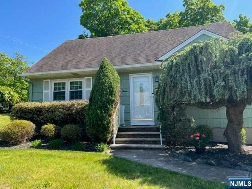 NEW LISTING! Enjoy living and entertaining in this lovely and inviting home with hardwood floors in the desirable borough of Dumont in Bergen County near Haworth border, New York City bus, shopping and its highly rated schools. First floor has sunny and bright living room with a large, attractive bay window, eat-in kitchen with good counter space and bay window opens into good-sized dining room with a fireplace, full bath and 2 bedrooms. Second floor has large bedroom, full bath and additional 4th bedroom or office. Flexibility with some rooms as home office. Large, full basement with recreation room and separate laundry and storage area. Nice backyard with deck located on generous-sized property approximately 90'x100'. Garage. Won't Last! All offers in writing with mortgage pre-approval or proof of funds.