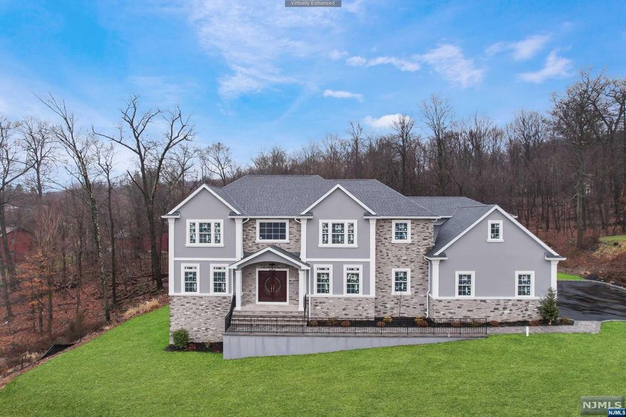 This is the last home in the 5 lot subdivision, Massola Estates. Spectacular home boasts over 4,900 sq ft. The estate is filled with charming touches including marble and hardwood floors, coffered ceiling and custom molding. 2-story Great room leads to the formal living room and dining room. Great room features fireplace and open concept living. The kitchen offers custom cabinetry, center island, ss appliances, wet bar, butlers pantry. Sliders lead to the spacious patio. Patio offers plenty of space for entertaining. Home office, laundry/mud room, bathroom, powder room and entry to 3- car attached garage complete the 1st floor. Retreat upstairs to find the primary suite with sitting area, walk-in closet and ensuite with free standing tub, stall shower and water closet. 3 additional bedrooms, each with it's own private bathroom completes the 2nd floor. Full unfinished basement w/walkout to side yard. Backyard offers plenty of space to enjoy all your favorite activities.