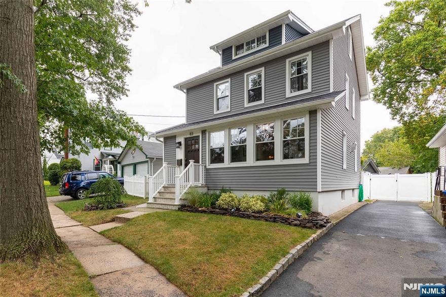 Welcome to 83 Van Riper Ave. This beautifully updated 4 bedroom, 2.5 bath Colonial offers generous living space, stylish updates, and a prime location with easy access to NYC transportation and major highways. The main level welcomes you into a bright, open layout, complete with a cozy stone fireplace, elegant dining area, and a modern white kitchen with stainless steel appliances and stone countertops. A sun-filled bonus sunroom offers the perfect space for a home office, reading nook, or relaxing retreat. Upstairs, youâ€™ll find well-sized bedrooms and updated bathrooms, while the finished basement provides flexible space for a playroom, home gym, or media area. A dedicated laundry/mudroom with built-in storage adds everyday ease. Outside, enjoy a large private fenced in yard, two-car detached garage and driveway.