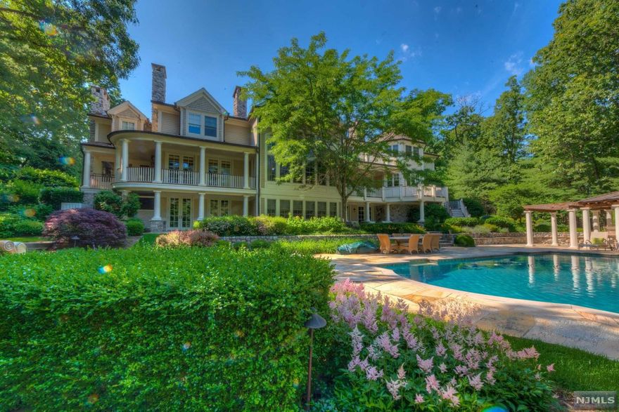 The quintessential Franklin Lakes estate!Pristine showcase property designed by AMA developers encompassing approx.9,200SF of elegant distinction. Architectural & scenic grandeur coincide at the spectacular European estate, nested on 2.25 manicured acres with breathtaking views at every turn.One of the largest properties available in desirable Highwood Gate section of Urban Farms.Best of old world sensibilities & contemporary brought together successfully. This residence beautifully showcases impeccable attention to detail.Large & opulent estate built for grand scale entertaining.The Marbled floor entry foyer opens to an elegant 2 story great room detailed w/wood paneling,built-ins and fireplace.Main level offers wide galleries throughout, an intimate living room w/FPL,grand sized dining room with wine cellar and battler pantry.Wood-panneled library w/fpl.Grand designer kitchen with two islands with large windows overlooking very private grounds,outstanding pool & outdoor kitchen.